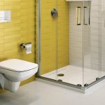 Ciekawa aranżacja żółtej łazienki